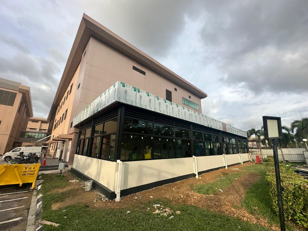 Biocon building exterior with a glazed ground-floor extension