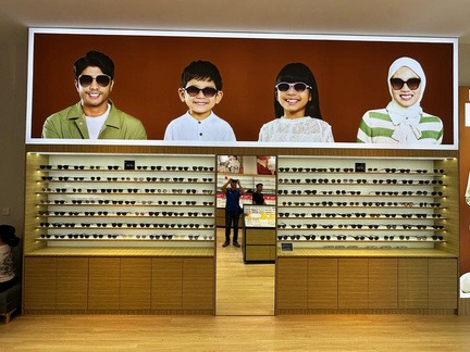 Optical retail interior with symmetrical eyewear display walls