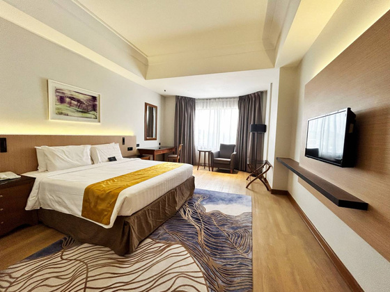 Completed Pearl Point Hotel guest room with timber wall panelling